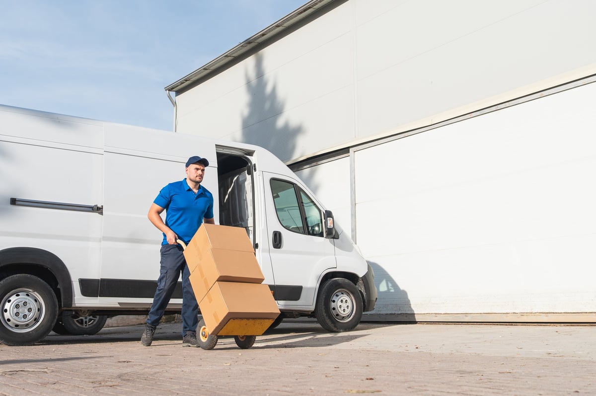 Delivery driver with packages